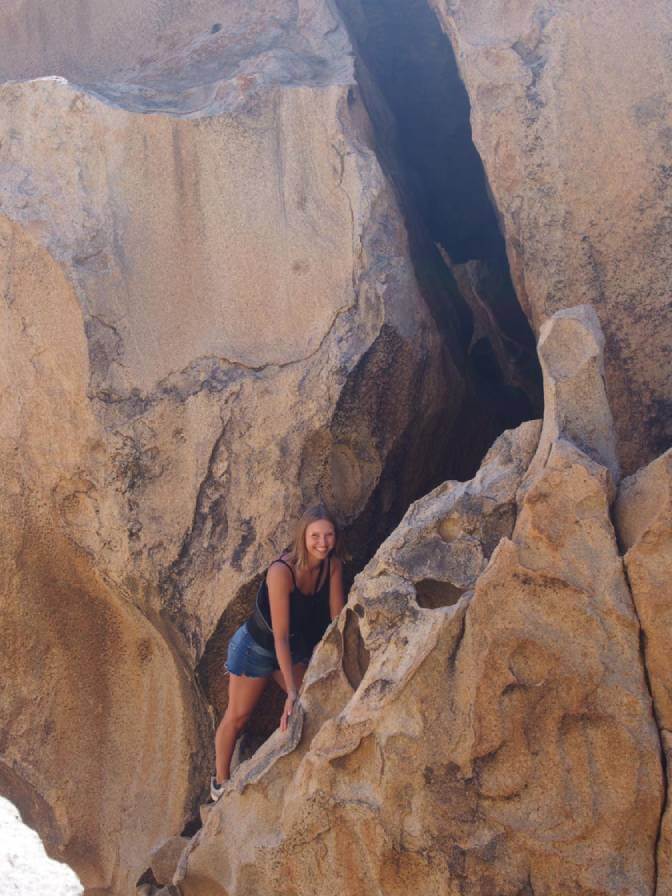 Intern climbing rocks